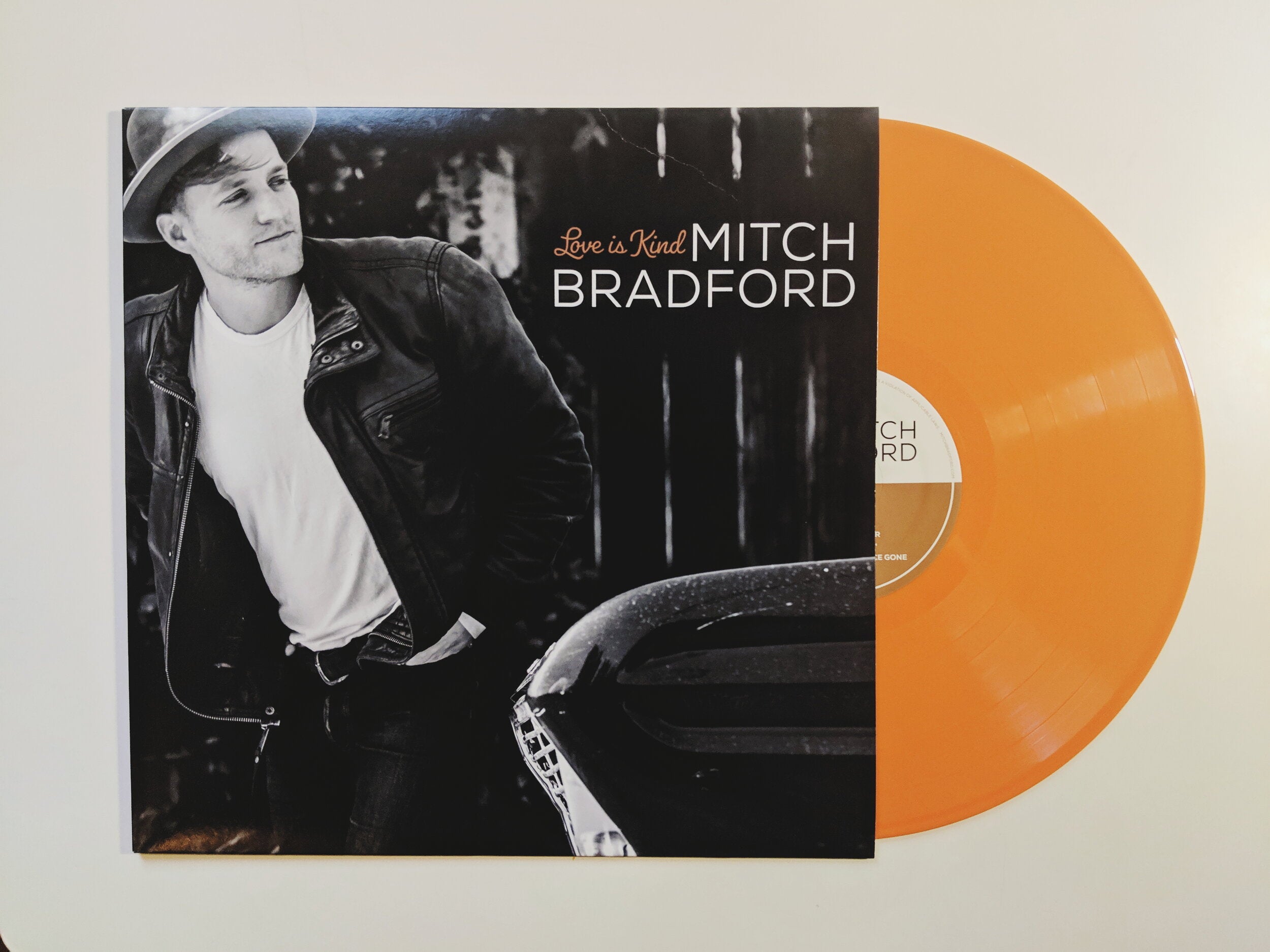 "Love is Kind" 12" LP -- Opaque Orange Vinyl (Limited Edition)