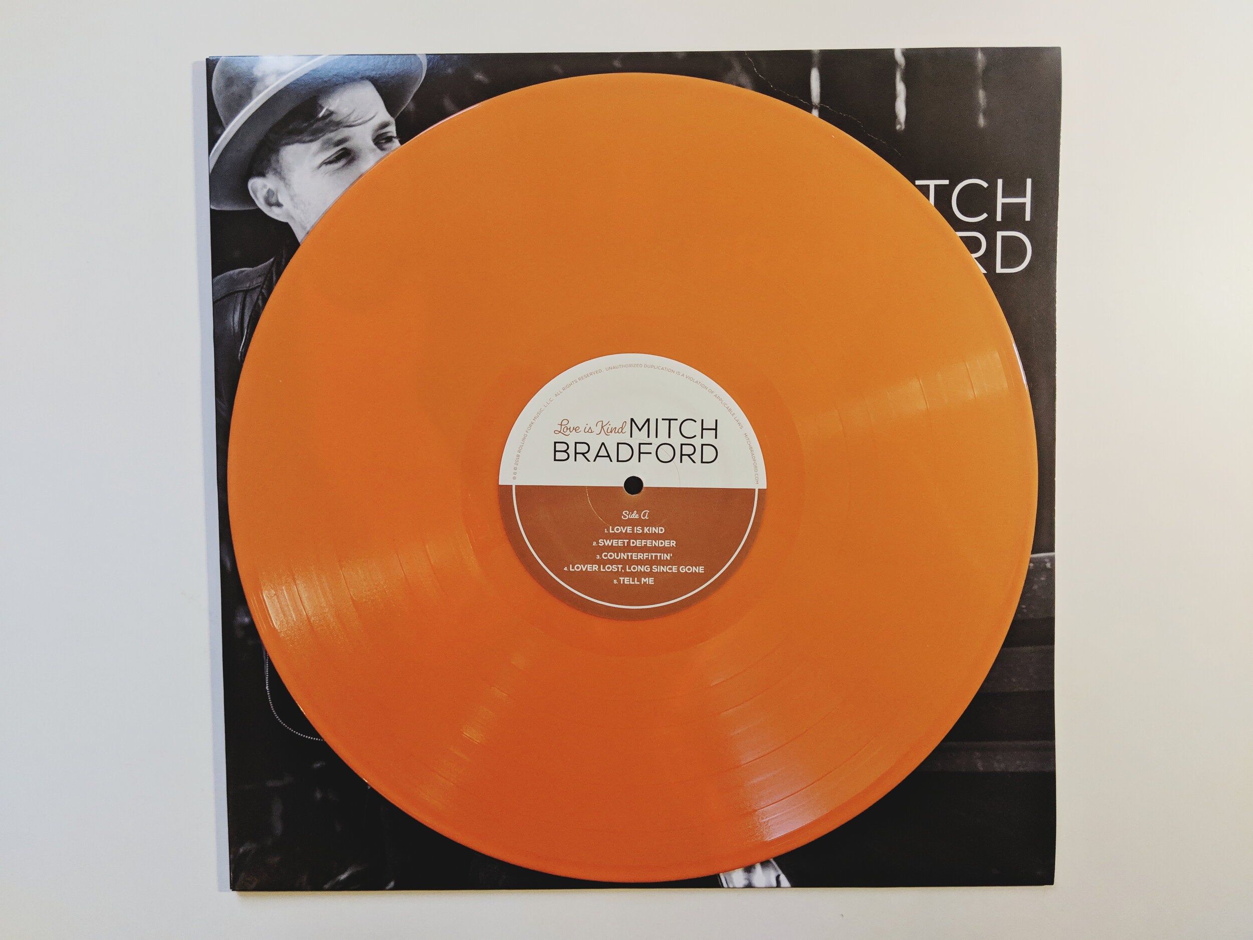 "Love is Kind" 12" LP -- Opaque Orange Vinyl (Limited Edition)
